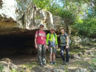 Anna Earle, Colin Bridge and Christine Couture at the sandstone cave, Ravensbourne NP