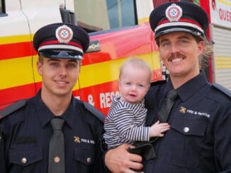 New firefighters Thomas Wensor and Darcy McCallum with baby Sully McCallum, 6 months