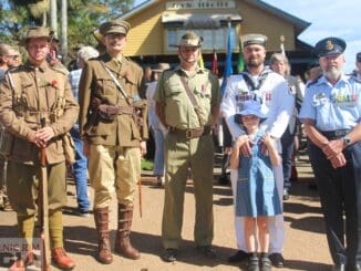 Reenactors with serving personnel