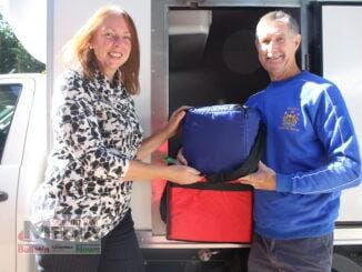 Tamborine Mountain volunteer Jodi Meynell with Beaudesert Meals on Wheels delivery driver Mick Watt