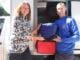 Tamborine Mountain volunteer Jodi Meynell with Beaudesert Meals on Wheels delivery driver Mick Watt