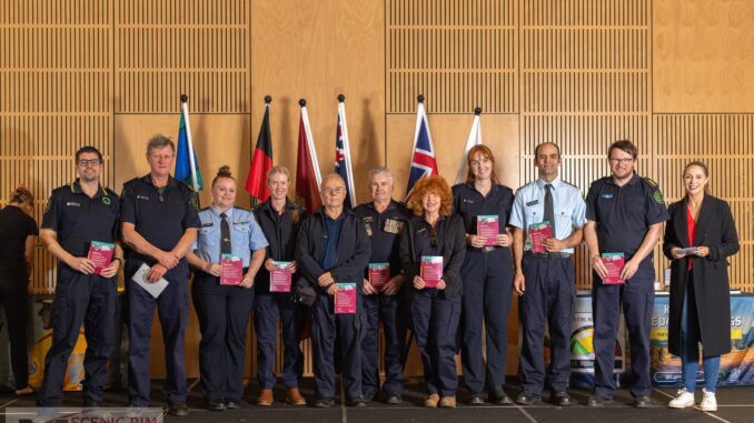 Tamborine Mountain Rural Fire Service members receive their award